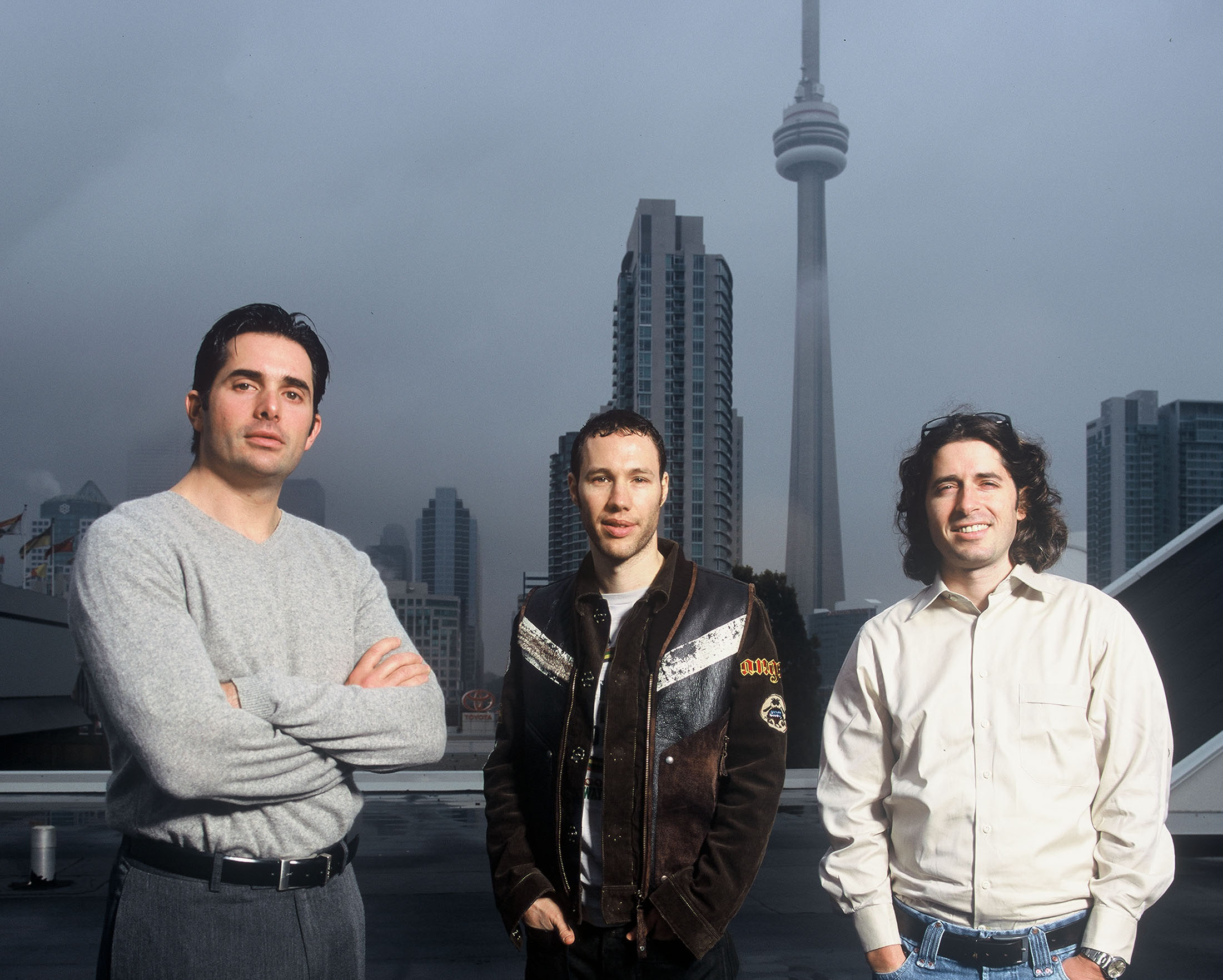 A photo of Spin Master's co-founders: Anton Rabie (left), Ronnen Harary (right), and Ben Varadi (middle)